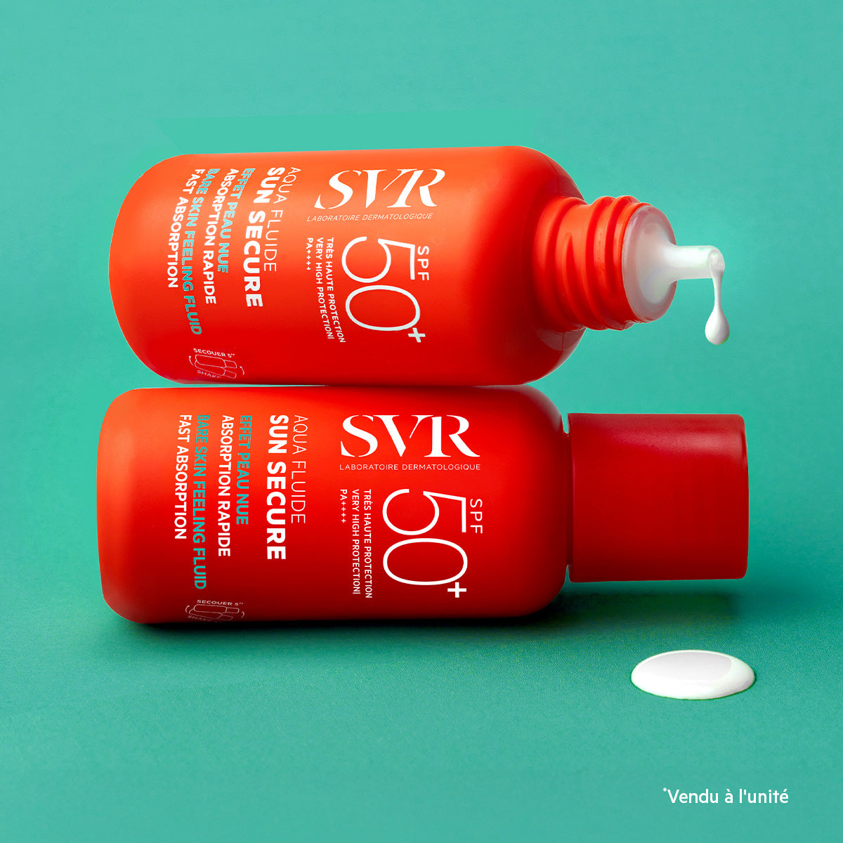 Two bright orange SVR SUN SECURE Aqua Fluide SPF50+ bottles on a teal background with white sunscreen drops.